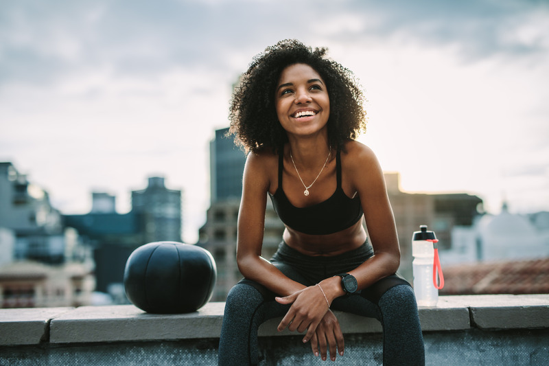 Patient with a straightened smile working out